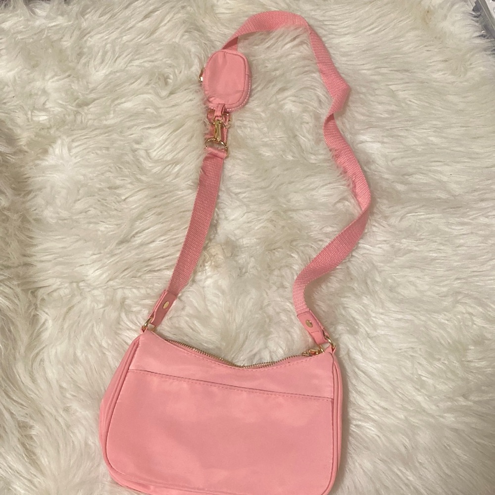 Pink cross over purse
